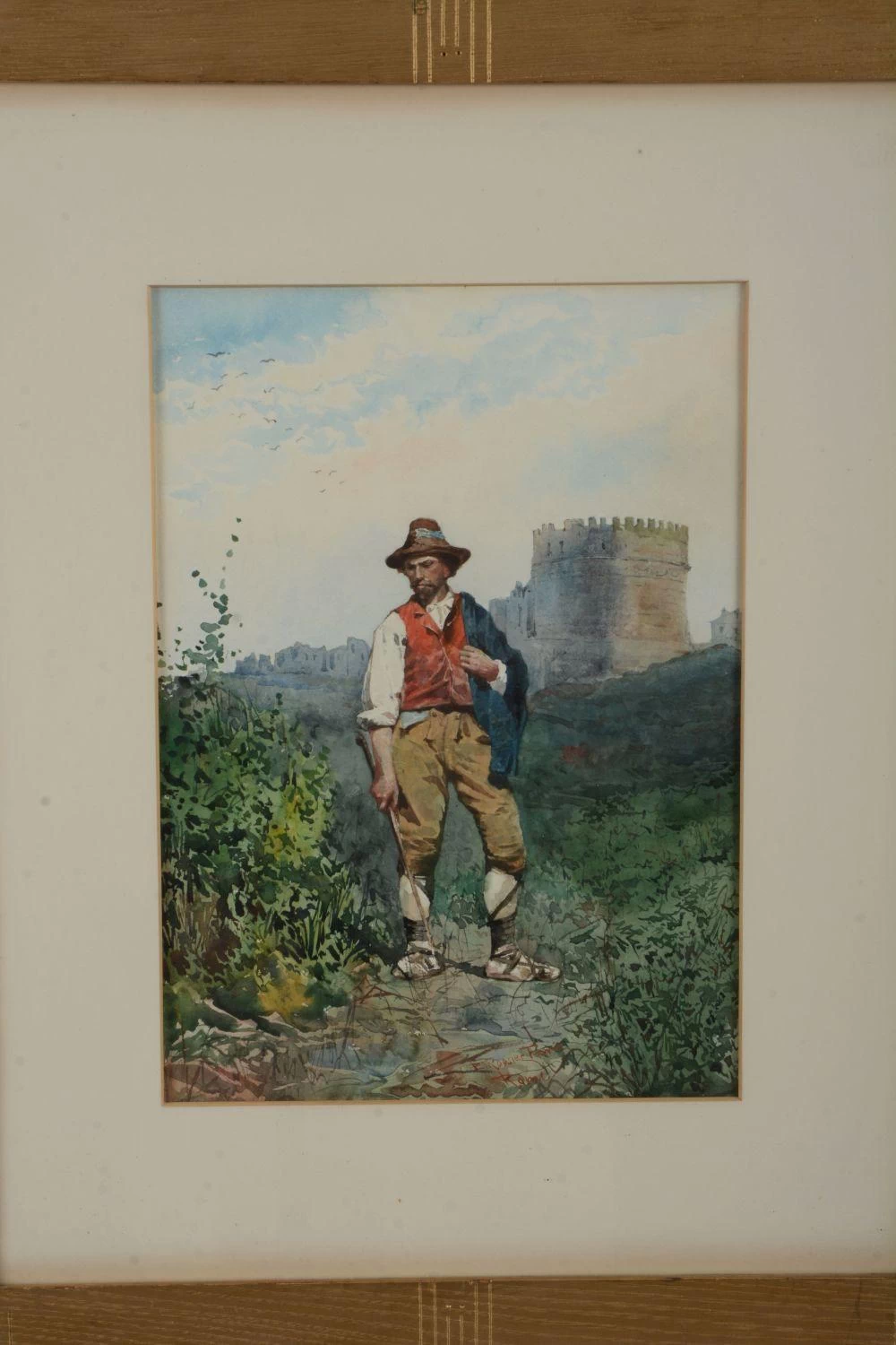 Uomo nel paesaggio tirolese con le rovine del castello